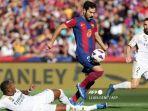 gelandang-barcelona-ilkay-gundogan-bersiap-mencetak-gol-ke-gawang-real-madrid.jpg