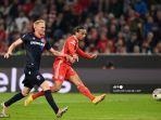 gelandang-bayern-munchen-leroy-sane-kanan-mencetak-gol.jpg