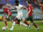 gelandang-ghana-05-thomas-partey-berduel-dengan-pemain-portugal-bernardo-silva.jpg