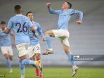 gelandang-inggris-manchester-city-phil-foden-merayakan-mencetak-gol-pertama-the-citizens.jpg