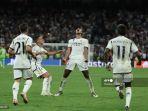 gelandang-inggris-real-madrid-5-jude-bellingham-tengah-merayakan-golnya.jpg