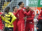gelandang-liverpool-asal-brasil-fabinho-kanan-merayakan-dengan-rekan-satu-timnya.jpg