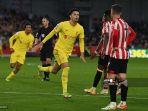 gelandang-liverpool-inggris-curtis-jones-tengah-merayakan-mencetak-gol-ketiga-the-reds.jpg