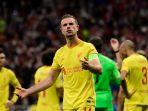 gelandang-liverpool-inggris-jordan-henderson-bereaksi-di-liga-champions.jpg