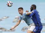 gelandang-manchester-city-ferran-torres-kiri-bersaing-dengan-antonio-rudiger-kanan.jpg