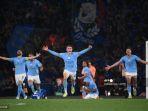 gelandang-manchester-city-phil-foden-tengah-merayakan-kemenangan-final-liga-champions.jpg