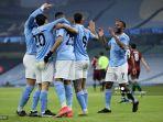 gelandang-manchester-city-raheem-sterling-kanan-merayakan-gol.jpg