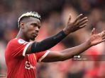 gelandang-manchester-united-asal-prancis-paul-pogba-memberi-isyarat-saat-dia-pergi.jpg