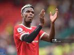 gelandang-manchester-united-asal-prancis-paul-pogba-memberi-isyarat.jpg