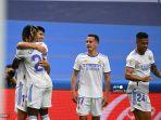 gelandang-real-madrid-spanyol-marco-asensio-kiri-merayakan-dengan-rekan-setimnya.jpg