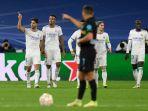 gelandang-real-madrid-spanyol-marco-asensio-kiri-merayakan-mencetak-gol-kedua-timnya.jpg
