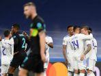 gelandang-real-madrid-toni-kroos-kanan-merayakan-dengan-rekan-setimnya.jpg