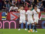 gelandang-sevilla-ivan-rakitic-kiri-merayakan-setelah-mencetak-gol.jpg