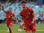gelandang-wales-kieffer-moore-merayakan-seusai-mencetak-gol-penyeimbang-atas-swiss.jpg