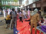gempa-bumi-memporak-porandakan-ruman-dan-puluhan-korban-jiwa_20221122_073450.jpg