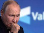 gestur-presiden-rusia-vladimir-putin-saat-pertemuan-tahunan.jpg