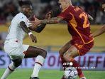gianluca-mancini-berduel-dengan-rafael-leao-di-laga-liga-italia.jpg