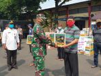 giat-bakti-sosial-polri-tni-dalam-rangka-percepatan-penanganan-c_20200515_130639.jpg