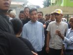 gibran-blusukan-di-pasar-rumput-jakarta_20231211_194330.jpg