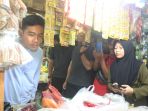 gibran-blusukan-di-pasar-rumput-jakarta_20231211_194425.jpg