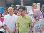 gibran-rakabuming-raka-dan-artis-raffi-ahmad-saat-blusukan-ke-kampung-deret-johar-baru-jakarta.jpg