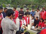 gmni-ziarah-ke-makam-taufiq-kiemas.jpg
