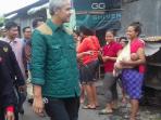 gubernur-ganjar-pranowo-tinjau-lokasi-banjir-di-solo_20160619_133153.jpg