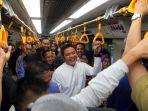 gubernur-sumsel-herman-deru-saat-naik-lrt.jpg
