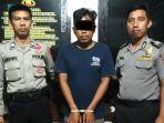 hadi-prayogo-tengah-diamankan-polsek-tumijajar-karena-diduga-m.jpg