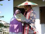 hadi-tjahjanto-menyerahkan-sertipikat-tanah-kepada-warga-kabupaten-kutai-kartanegara.jpg