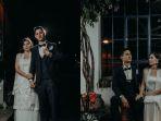 hannah-dan-nino-terlihat-bergandengan-dengan-cahaya-cukup-terang-di-belakang-mereka.jpg