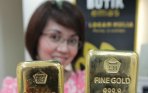 harga-emas-logam-mulia-antam-merangkak-naik_20150107_115028.jpg