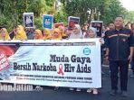 hari-aids-sedunia-whisnu-sakti-buana-turun-ke-jalan-gelar-aksi-bareng-ratusan-relawan-dan-aktivis.jpg