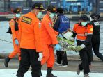 hari-ke-9-pencarian-korban-dan-puing-sriwijaya-air-sj-182_20210117_224435.jpg