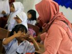 hari-pertama-sekolah-di-makassar_20190715_181659.jpg