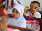 hari-pertama-sekolah-di-makassar_20190715_182308.jpg