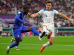 harry-maguire-hadang-timothy-weah_20221126_023859.jpg