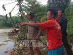 hartoyo-saksi-mata-mobil-terjun-ke-sungai-brantas.jpg