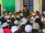 haul-syech-sulaiman-kyai-cagak-luas-bersama-kh-musthofa-bisri_20200105_213931.jpg