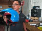 helm-terduga-teroris-yang-tertinggal-di-dekat-lapak-pedagang-buah_20180511_202235.jpg