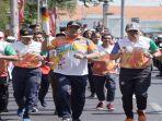 hendi-berlari-bawa-obor-asean-school-games-2019.jpg