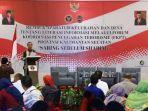 hendri-paruhuman-lubis-saat-membuka-rembuk-aparatur-kelurahan.jpg