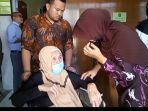 hj-darmina-pasca-mengikuti-persidangan-gugatan-dari-anak-kandungnya.jpg