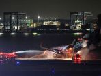 horor-pesawat-terbakar-di-bandara-haneda-tokyo_20240103_070900.jpg