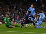 hujan-gol-di-etihad-man-city-kalahkan-real-madrid_20220427_050848.jpg