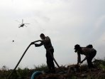 hutan-dan-lahan-di-pekanbaru-kembali-dilalap-api_20160829_210434.jpg