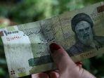 ilustrasi-mata-uang-riyal-iran.jpg