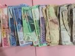ilustrasi-uang-barang-bukti_20180226_061651.jpg
