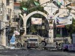 israel-serang-jenin-militan-palestina-melawan_20230704_204531.jpg
