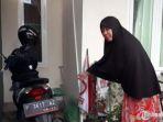 istri-korban-saat-menunjukkan-lokasi-honda-scoopy-hilang-diambil-pelaku-curanmor.jpg